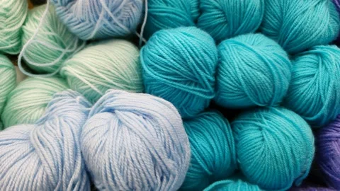 Yarn for knitting close-up. Woolen threads of blue shades Stock Footage 171209024