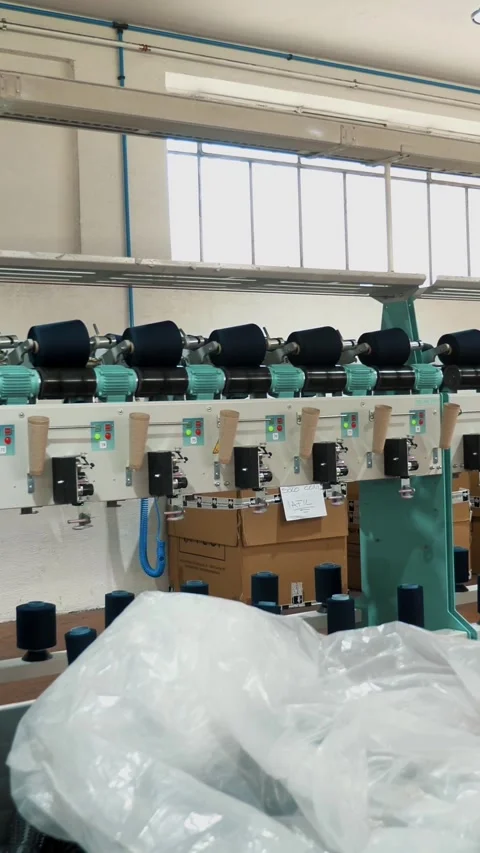 Yarn making processes. Textile factory equipment. Spinning production. Threads Stock Footage 315442510