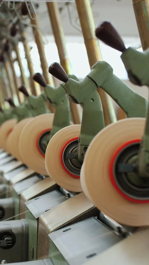 Yarn making processes. Textile factory equipment. Spinning production. Threads Stock Footage 317849778