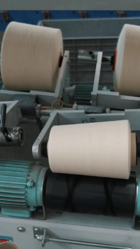 Yarn making processes. Textile factory equipment. Spinning production. Threads Stock Footage 318592498