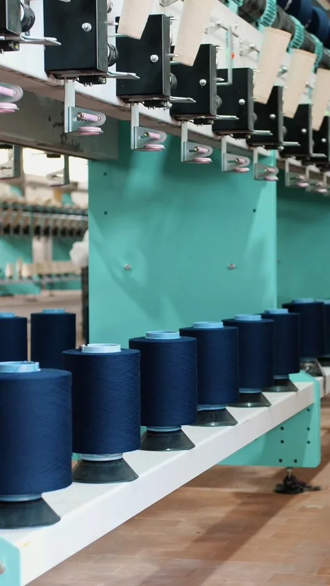 Yarn making processes. Threads production. Textile factory equipment. Textile Stock Footage 318077728