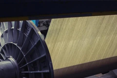 Yarn manufacturing by machine. Stock Photos