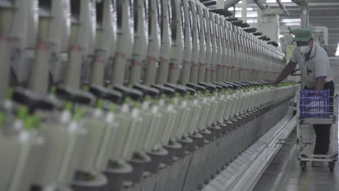 Yarn spinning automatic machine is operating on factory Stock Footage 248798564