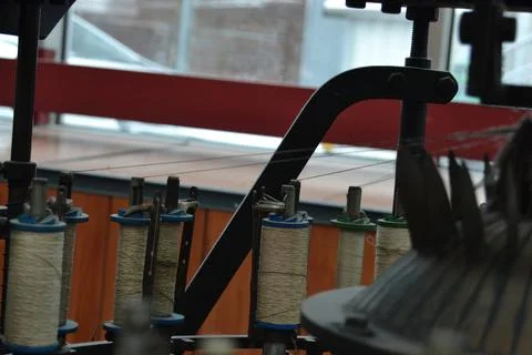 Yarn in a textile machine Stock Photos