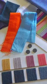 Yarn thread and knit sample color card and buttons Stock Photos