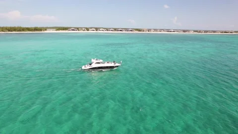 Yatch speeding at bimini beach Stock Footage 232437557
