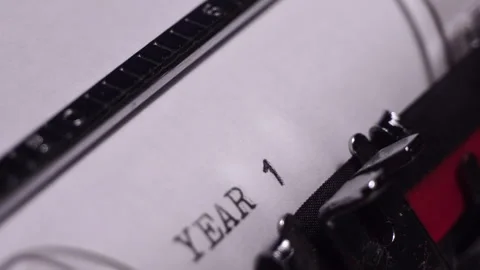 Year 1971, Typing in Vintage Typewriter on Blank White Paper, Close Up Stock Footage 277377097
