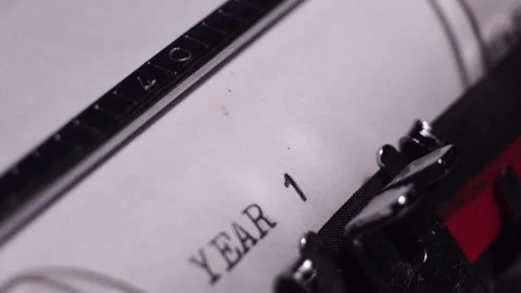 Year 1973, Typing on Blank White Paper in Vintage Typewriter, Close Up Stock Footage 277377111