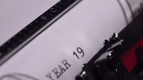 Year 1974, Typing on Blank White Paper in Vintage Typewriter, Close Up Stock Footage 277377116