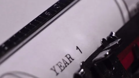 Year 1976, Typing on Blank White Paper in Vintage Typewriter, Close Up Stock Footage 277407848
