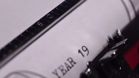 Year 1982, Typing on Blank White Paper in Vintage Typewriter, Close Up Stock Footage 277642094