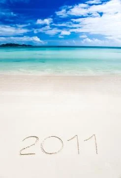 Year 2011 writenn in the sand Stock Photos