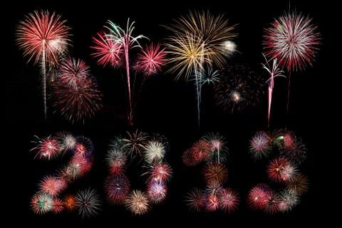 The year 2013 written in fireworks below bursts Illustrazione stock