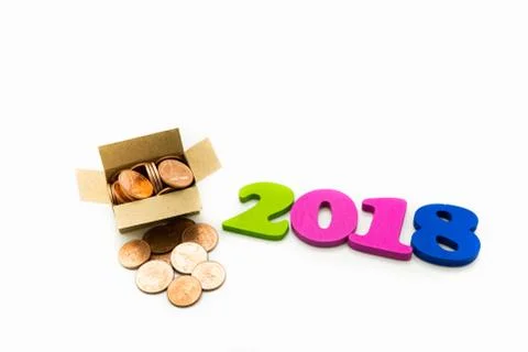 Year 2018 wooden block with stack coins in paper box Stock Photos