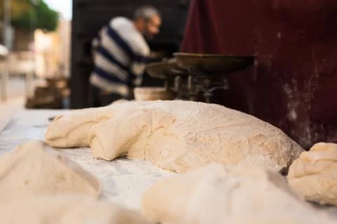 Yeast dough on baking table. cooking process Foto stock