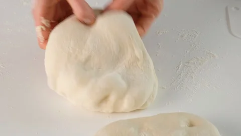 Yeast dough. Female hands making raw dough for Italian food Pizza roll stromboli Stock Footage 129699147