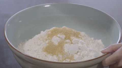 Yeast into dough Stock Footage 95842947