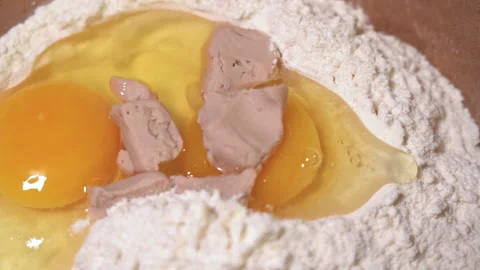 Yeast is poured into flour Stock Footage 254166963