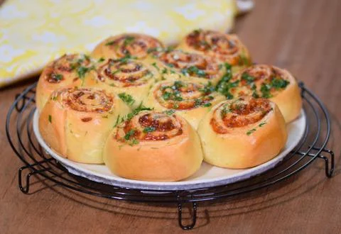 Yeast Roll buns with cheese. Bread rolls with garlic and parsley. Stock Photos