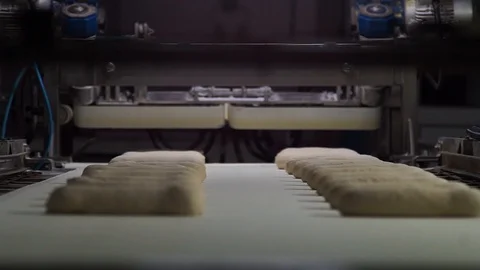 Yeast Rolls Falling Into Container Vertical Stock Footage 90122771