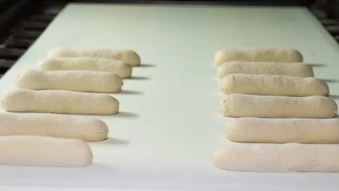 Yeast Rolls Moved On Roller  Stock Footage 90122746