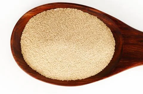Yeast in spoon Stock Photos