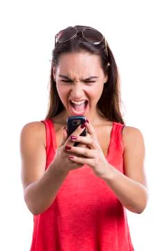 Yelling to a cellphone Stock Photos