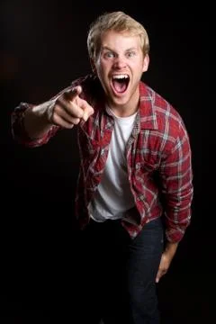 Yelling pointing man Stock Photos