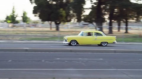 Yellow 1955 Chevy custom Stock Footage 279865391