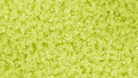 Yellow 3d rotating glass marble shiny glitter messy geometrical background Stock Footage 307672154