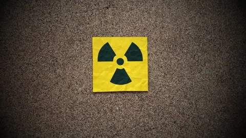A yellow adhesive note with the radiation warning sign Stock Footage 301322404
