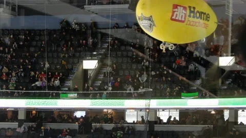 Yellow Advertising Blimp Floating Around Hockey Game Stock Footage 224927484