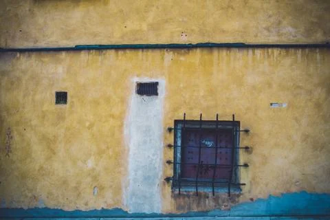 Yellow aged wall with grid Stock Photos