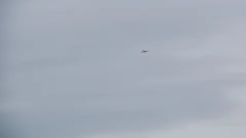 Yellow Aircraft Doing Acrobatic Maneuvers In Sky Stock Footage 121172571