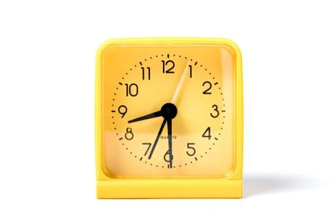 Yellow alarm clock Stock Photos