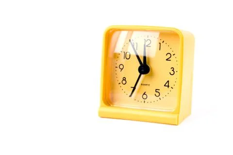 Yellow alarm clock Stock Photos