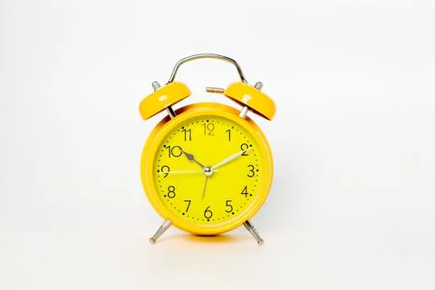 Yellow alarm clock Stock Photos