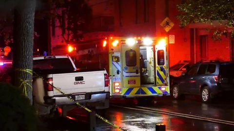 Yellow ambulance at night Stock Footage 116710735