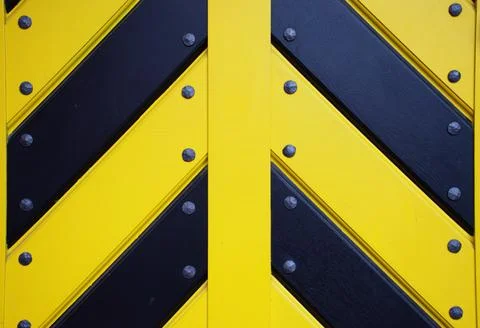 Yellow and Black Chevron Pattern Metal Background With Industrial Texture Stock-Fotos