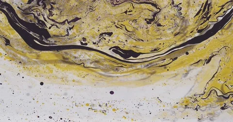 Yellow and Black Marbled Pattern Flowing Stock Footage 228750440