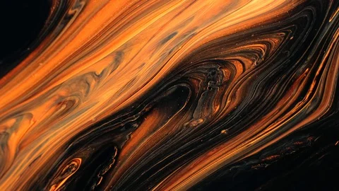 Yellow and black psychedelic patterns of multi-colored paints mixed with each Stock Footage 123743436