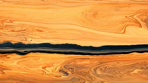 Yellow and black psychedelic patterns of multi-colored paints mixed with each Stock Footage 123744599