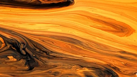 Yellow and black psychedelic patterns of multi-colored paints mixed with each Stock Footage 123744840