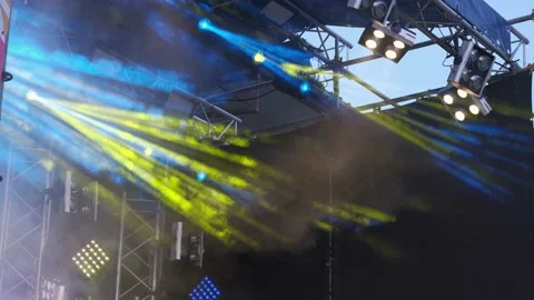 Yellow and Blue rays of Light. Lighting Equipment on a stage decoration on a con Stock Footage 136052334