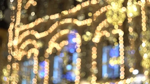 Yellow and gold light spots. The facade of the building is decorated Stock Footage 121840653