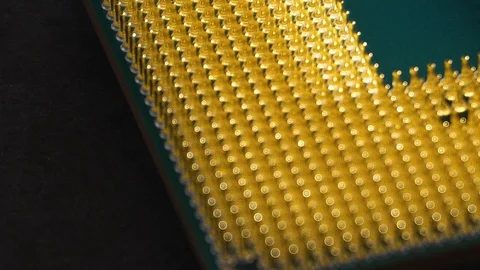 Yellow and green central processing unit (CPU), slow pan, extreme close up Stock Footage 130090826