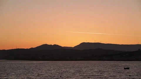Yellow and orange sunset over the river Stockbeeldmateriaal 149124022