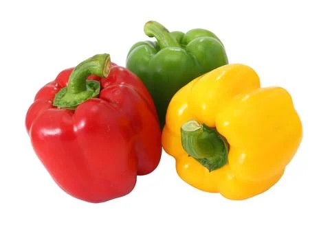 Yellow and red bell peppers on a white background, essential food ingredients Stock-Fotos
