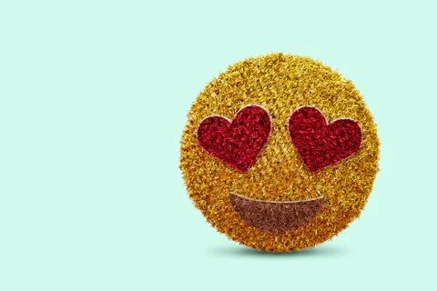 Yellow and red colered face shape emoticon, showing love feeling. Happiness Stock Photos