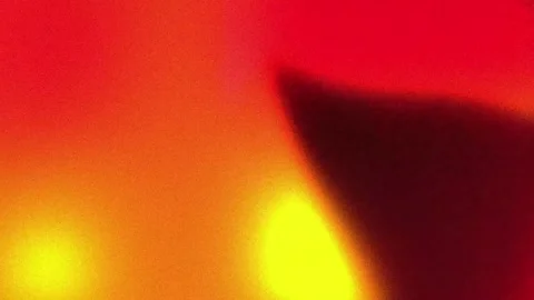 Yellow and red neon blur background with bright glow, abstract seamless loop vid Stock Footage 340875344